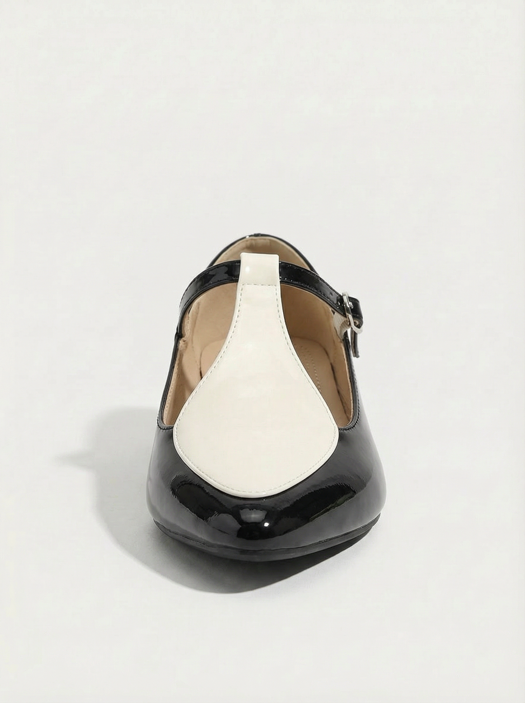 FLAT SHOES WITH POINTED TOES AND A T-BAR STRAP