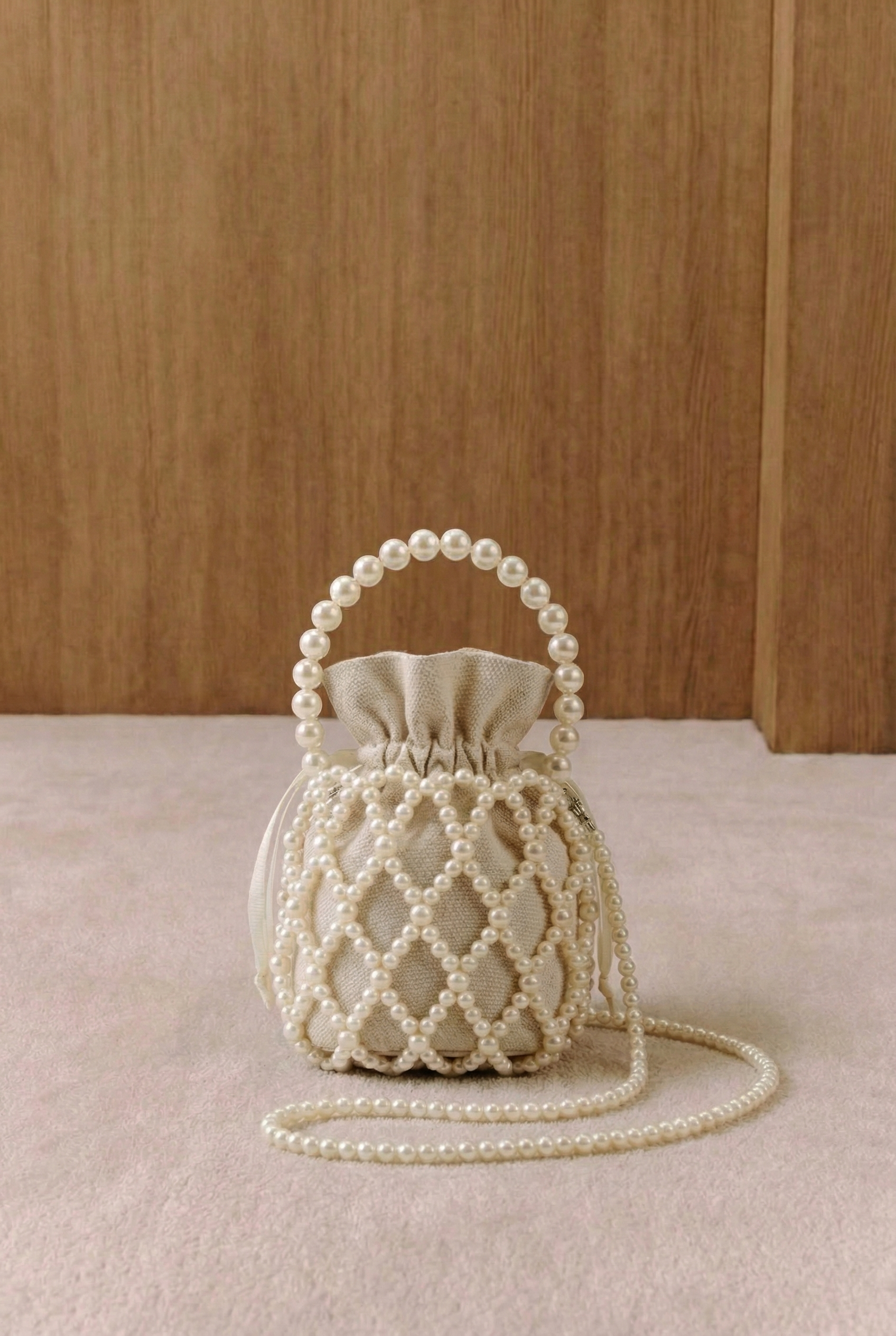 Aria Pearl Cage Bucket Bag